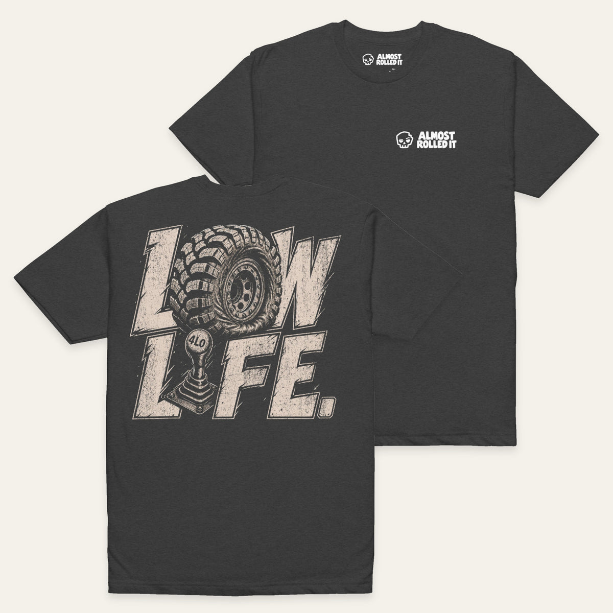 Low Life Tee in Charcoal — paired flat lay, back lower left and front upper right. Supplier-derived product mockup.