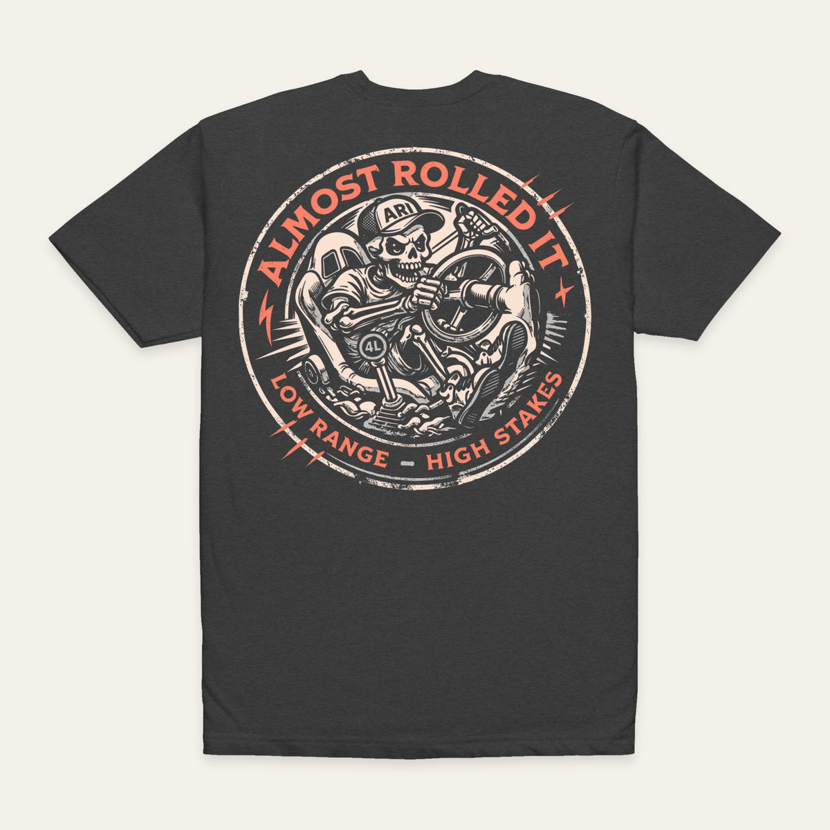 Skull Driver Tee in Charcoal — back flat lay. Supplier-derived product mockup; artwork and placement preserved.