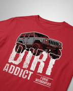 Dark charcoal gray t-shirt featuring a white graphic of a lifted Jeep Cherokee XJ captioned 'Dirt Addict.' - Charcoal Heather XJ Dirt Addict T-Shirt with distressed Jeep Cherokee graphic. - red - front