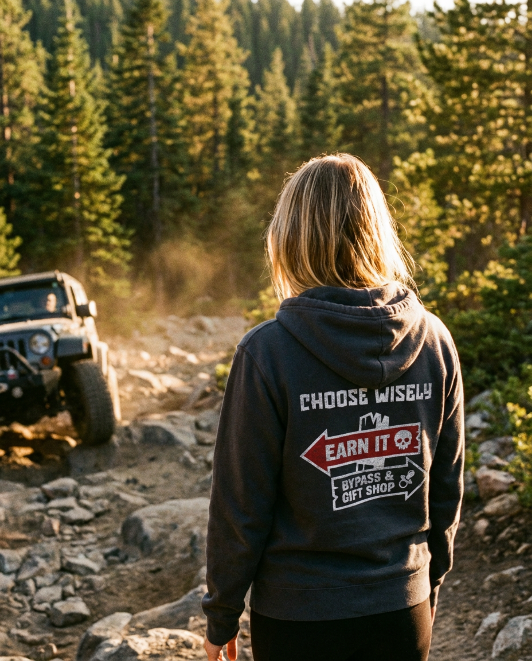 Dark charcoal full-zip hoodie featuring the Almost Rolled It 'Choose Wisely' skull and wrench graphic. - Black full-zip hoodie with the 'Choose Wisely' graphic for off-road enthusiasts. - ARI Choose Wisely Hoodie featuring a bold, weathered-style graphic that captures the gritty spirit of off-road life. - Back View