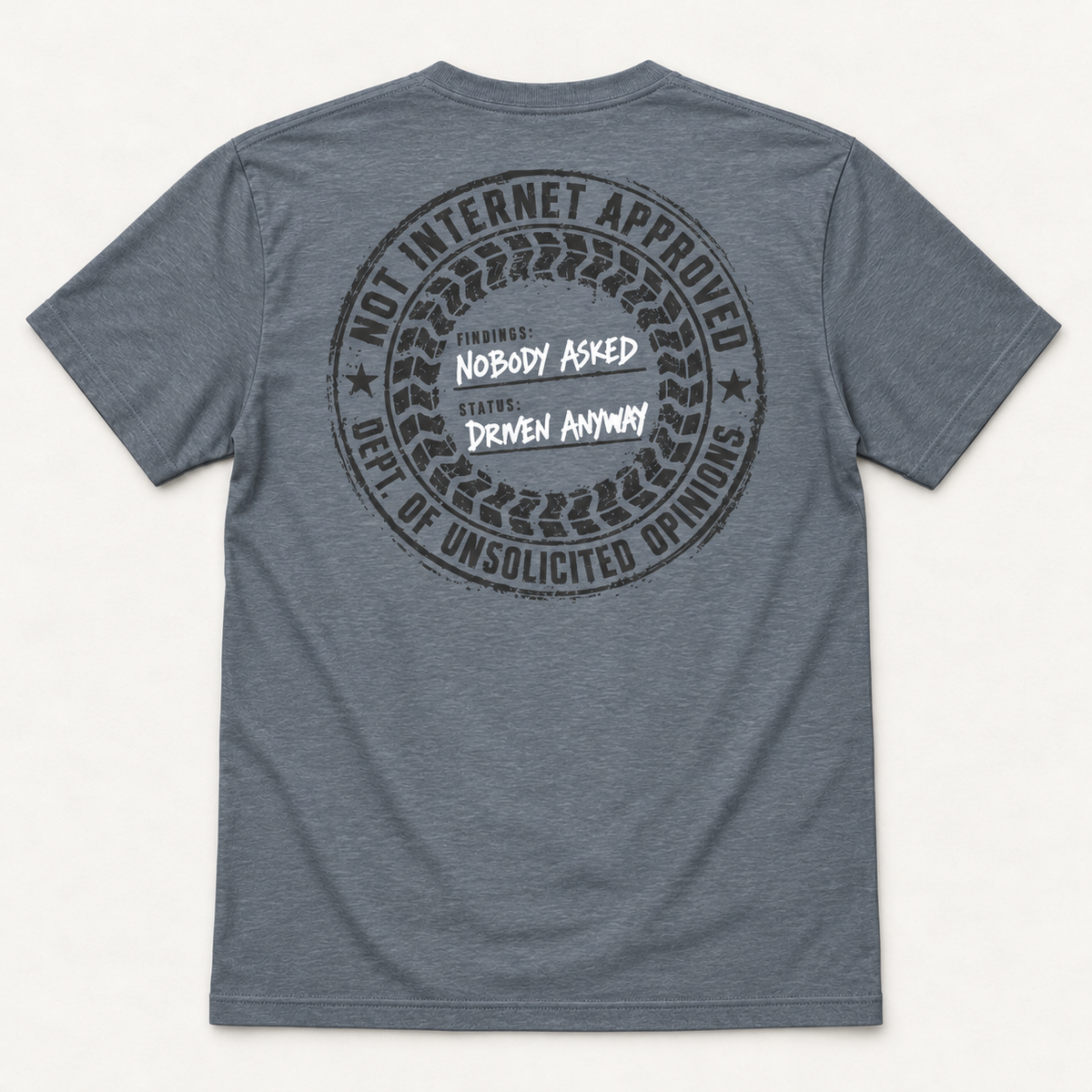 Nobody Asked tee in Vintage Denim blue grey, back flat lay showing the Not Internet Approved tire stamp with Nobody Asked and Driven Anyway.