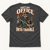 Out of Office tee in Dark Grey, back flat lay showing the skeleton recovery graphic and Out of Office Into Trouble lettering.