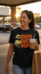 Dark charcoal graphic t-shirt featuring the 'Duck Duck Nope' design in a hand-detailed, gritty style for off-road enthusiasts. - black - front