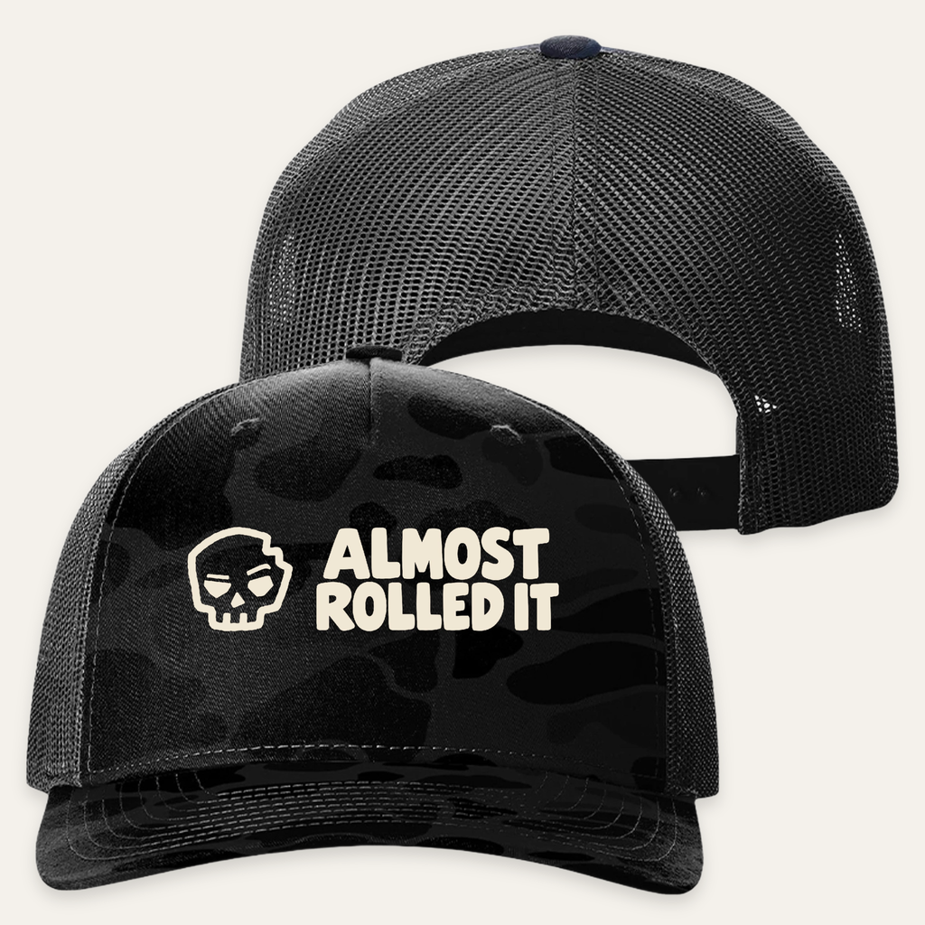 ARI Logo Trucker Hat in Sable Duck Camo/ Black — paired front and back flat lay