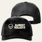 ARI Logo Trucker Hat in Sable Duck Camo/ Black — paired front and back flat lay