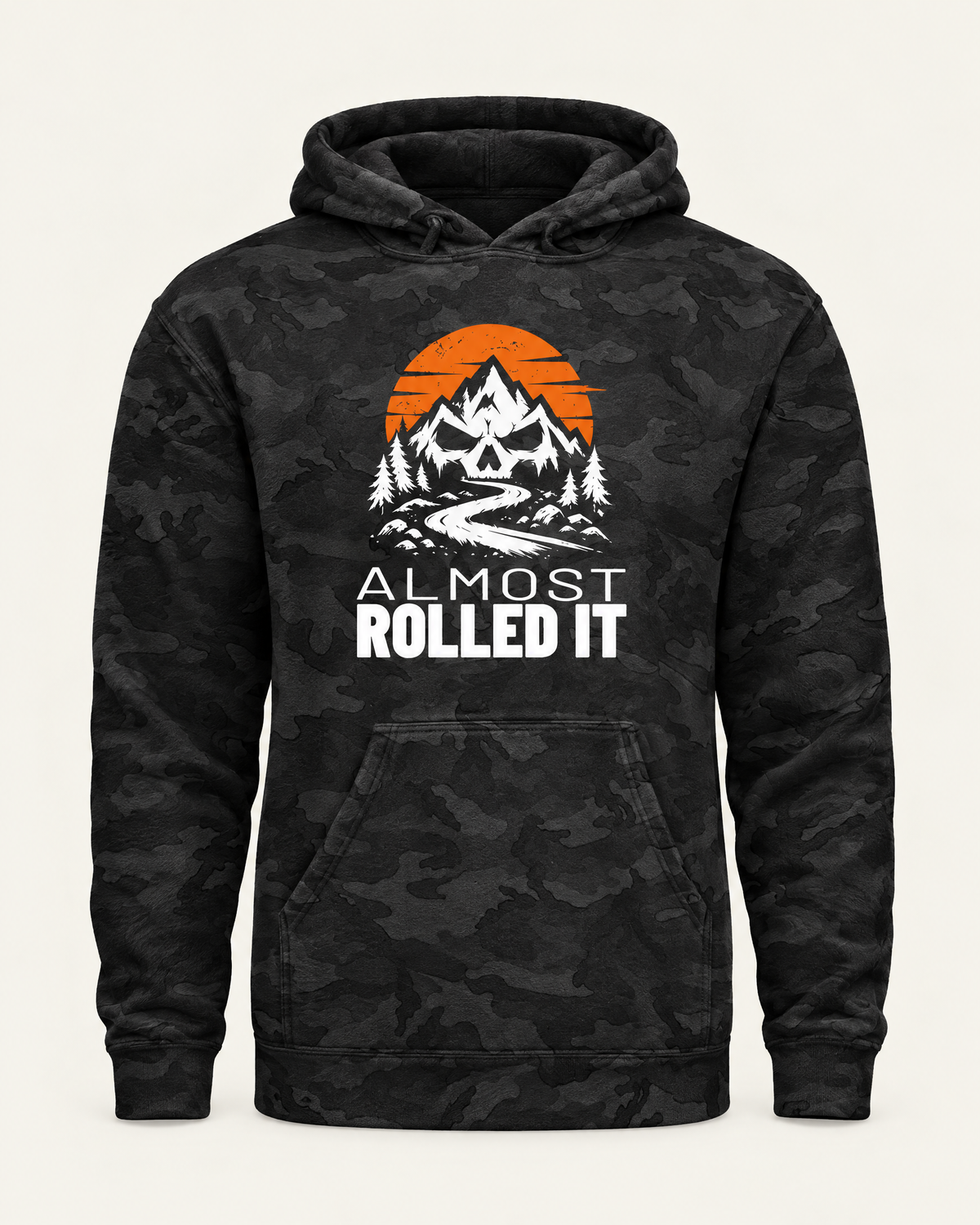 Almost Rolled It Camo Hoodie in black camo, front view, with the skull-and-mountains mark on the chest