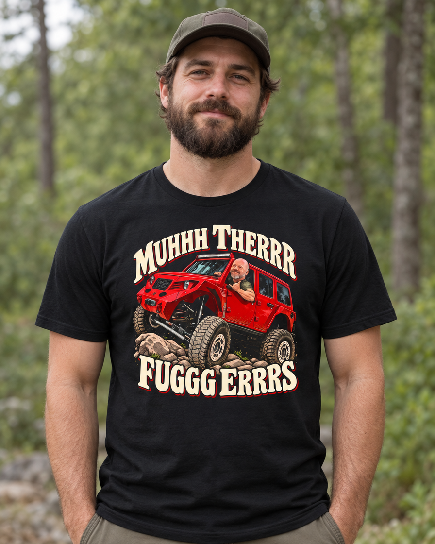 Man in a cap wearing the vintage black Fuggers tee in the forest, front print on the chest