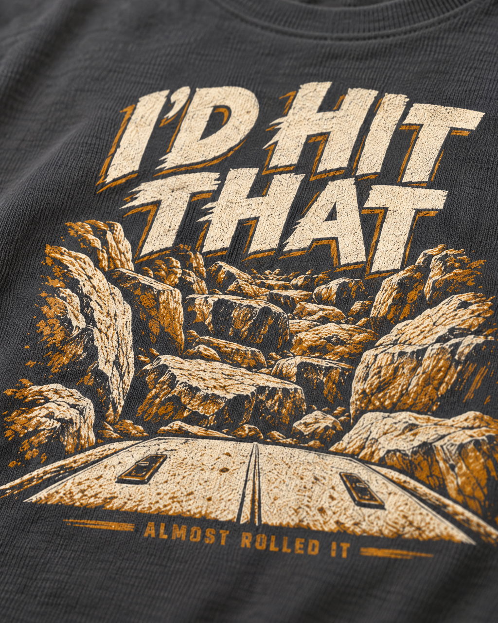 Close-up of the I'D HIT THAT front print on dark grey cotton