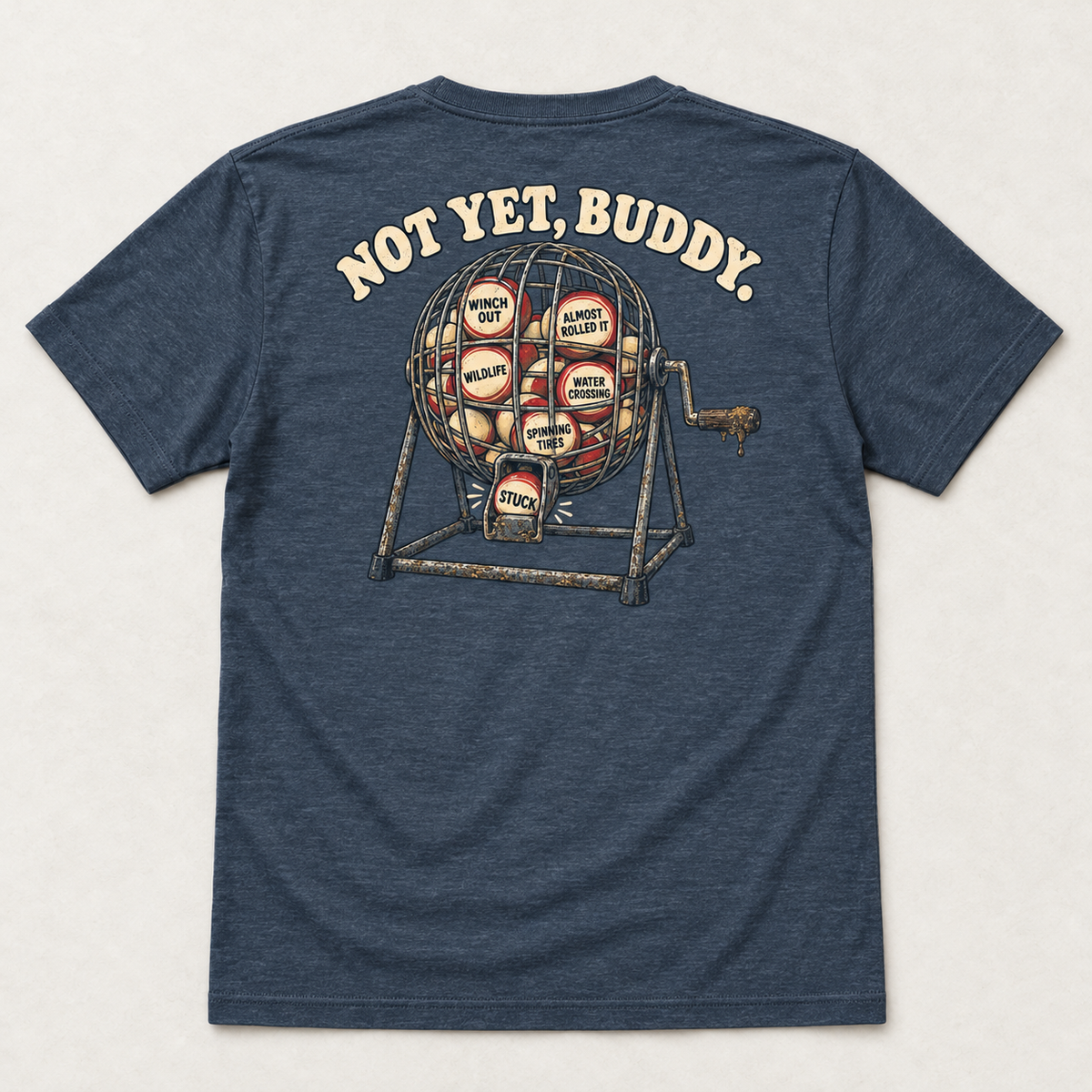 Are We Stuck Yet? adult tee in Vintage Navy, complete back flat lay showing the Not Yet, Buddy bingo-cage print.