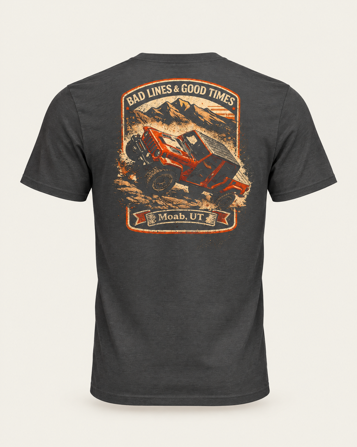 Shibby Bad Lines tee in dark grey, back view: Bad Lines and Good Times badge with an orange rig crawling rocks, Moab, UT