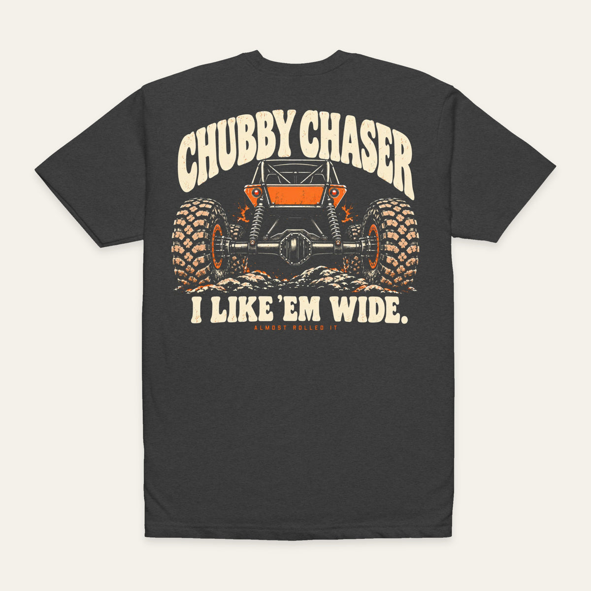 I like 'em wide Tee — Chubby Chaser in Charcoal — back flat lay. Supplier-derived product mockup; artwork and placement preserved.