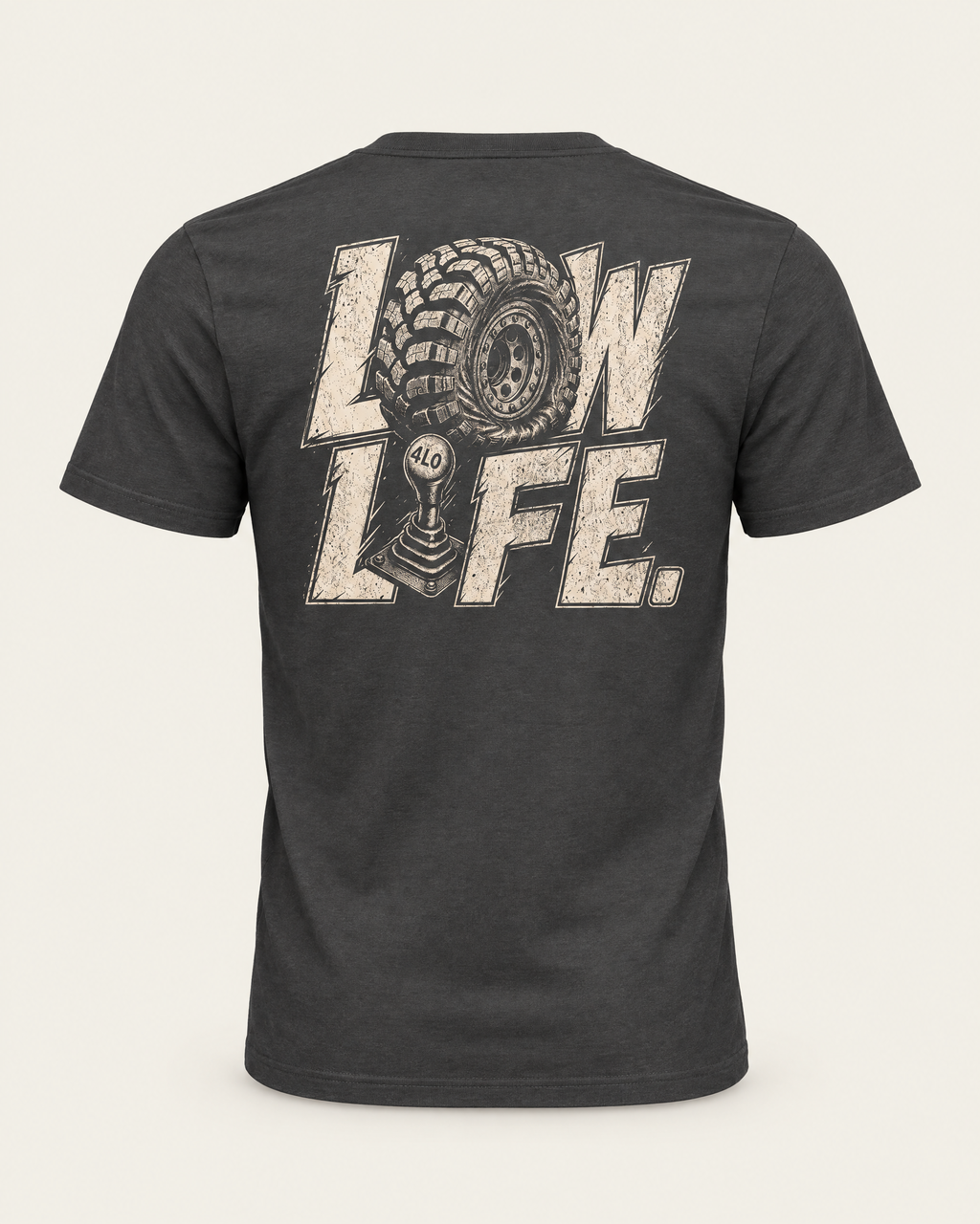 Low Life tee in dark grey, back view: cream LOW LIFE lettering with an off-road tire and 4LO shifter