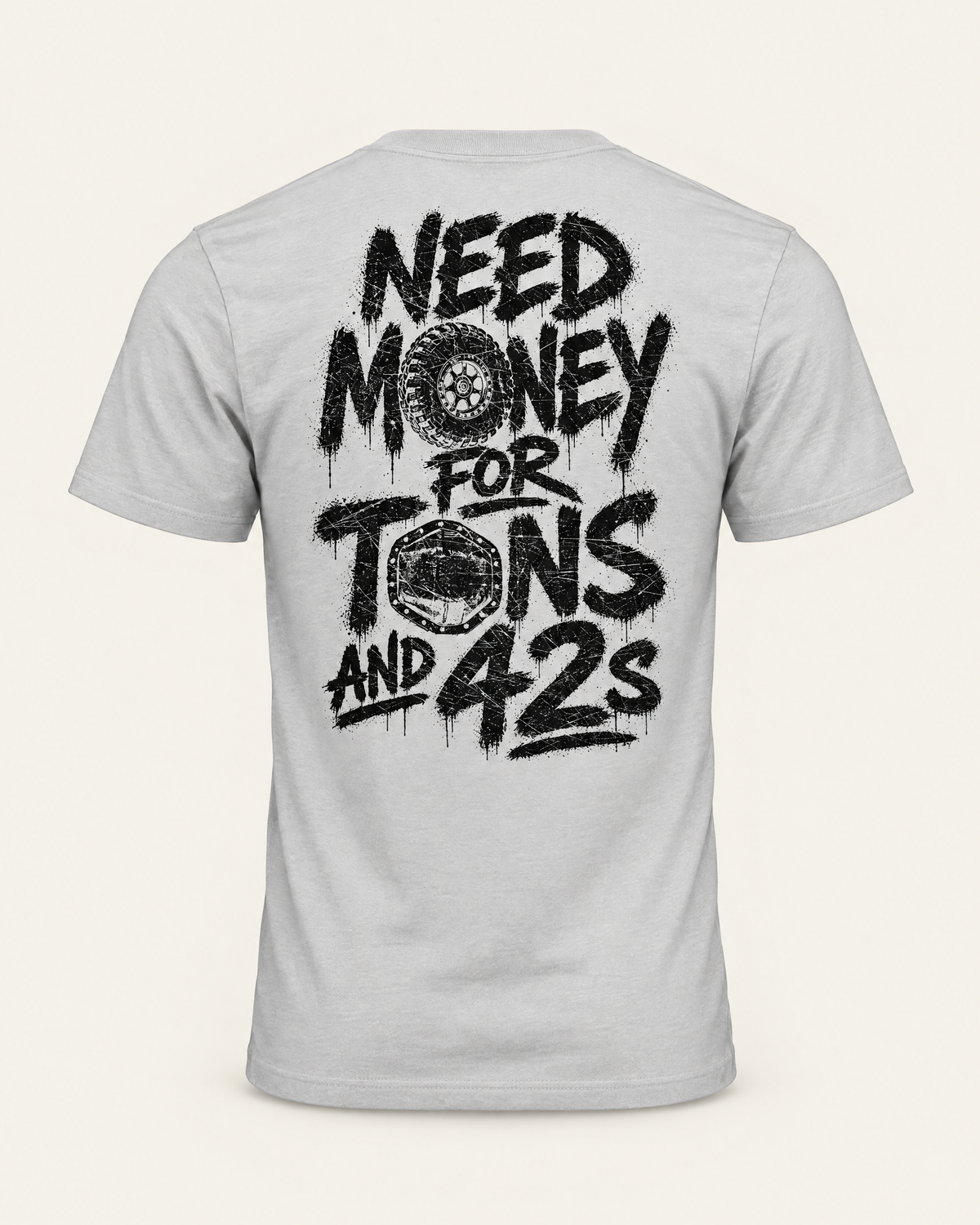 Tons & 42s tee in silver, back view: black brush lettering reading Need Money for Tons and 42s