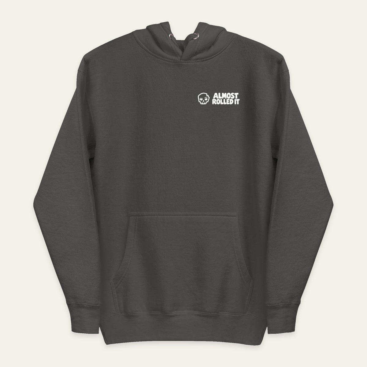 ARI Pullover Hoodie in Vintage Black — front flat lay. Supplier-derived product mockup; chest artwork and placement preserved.