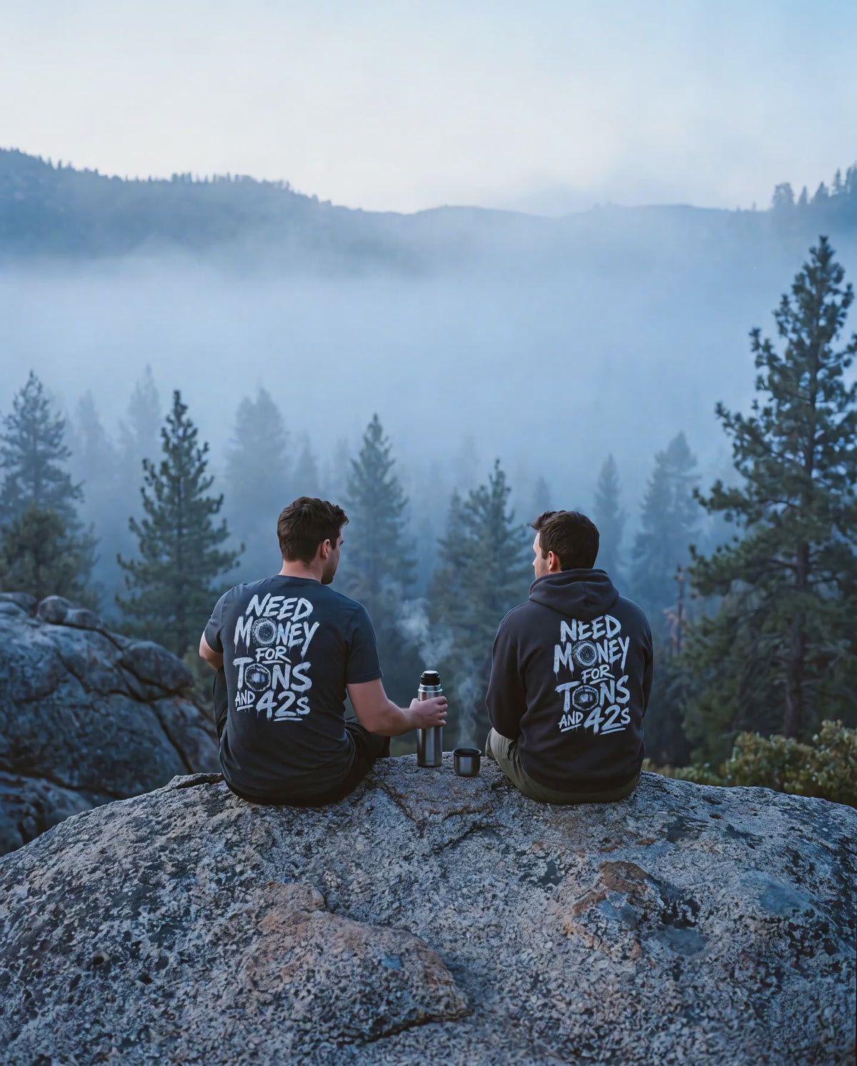 Fog drifting past two friends in Tons & 42s on a granite boulder