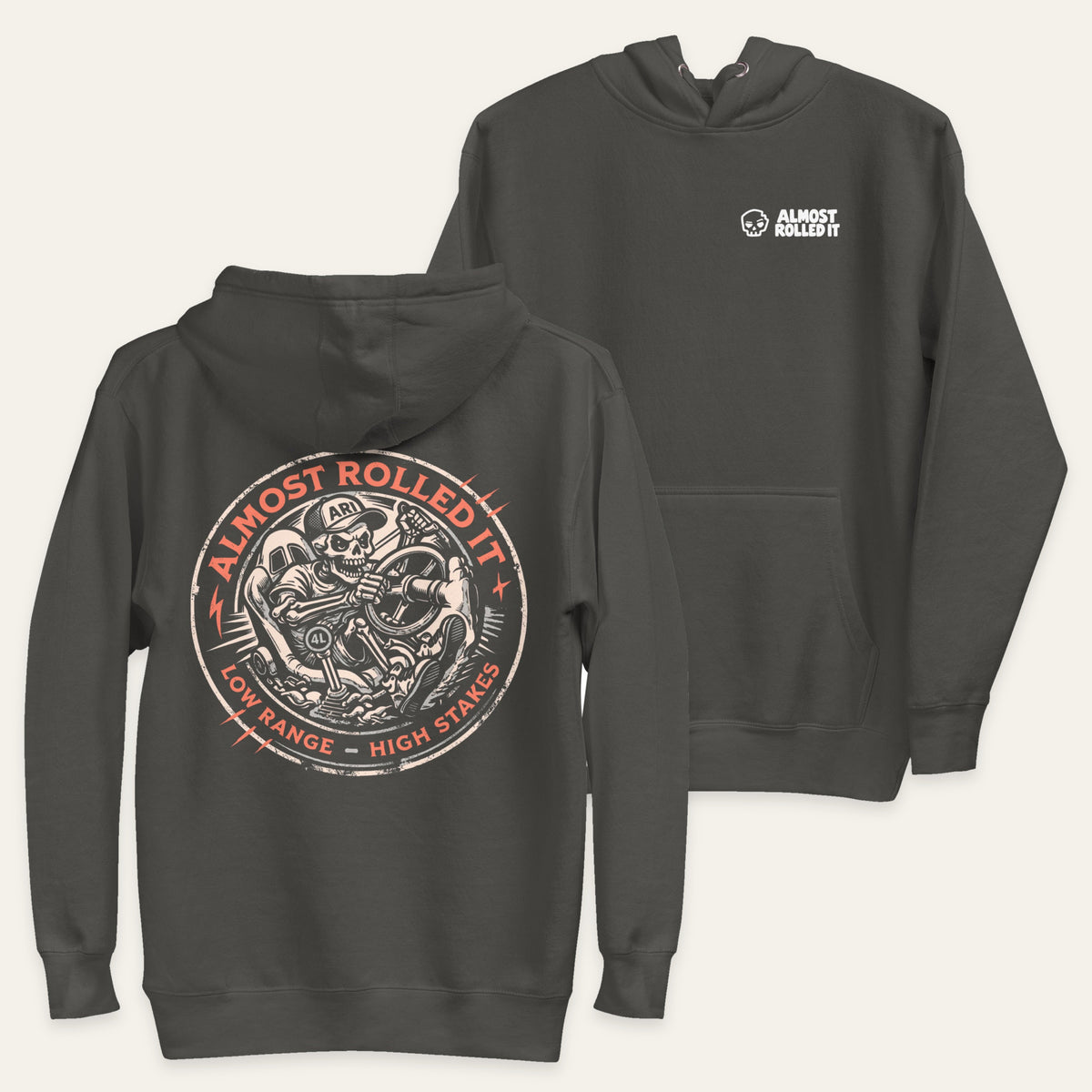 Skull Driver Hoodie in Vintage Black — paired flat lay, back lower left and front upper right. Supplier-derived product mockup.