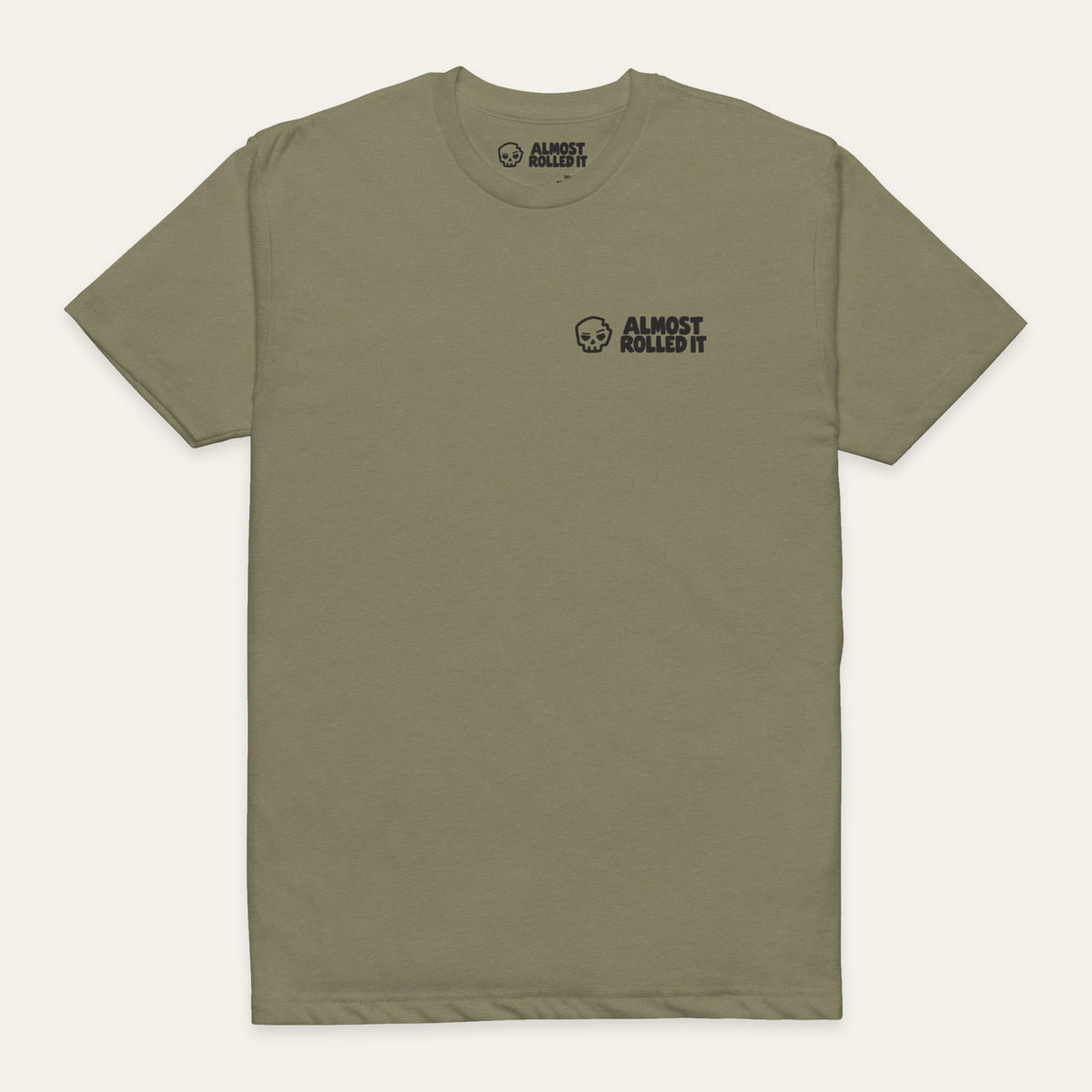 ARI Core Tee in Military Green — front flat lay. Supplier-derived product mockup; chest artwork and placement preserved.